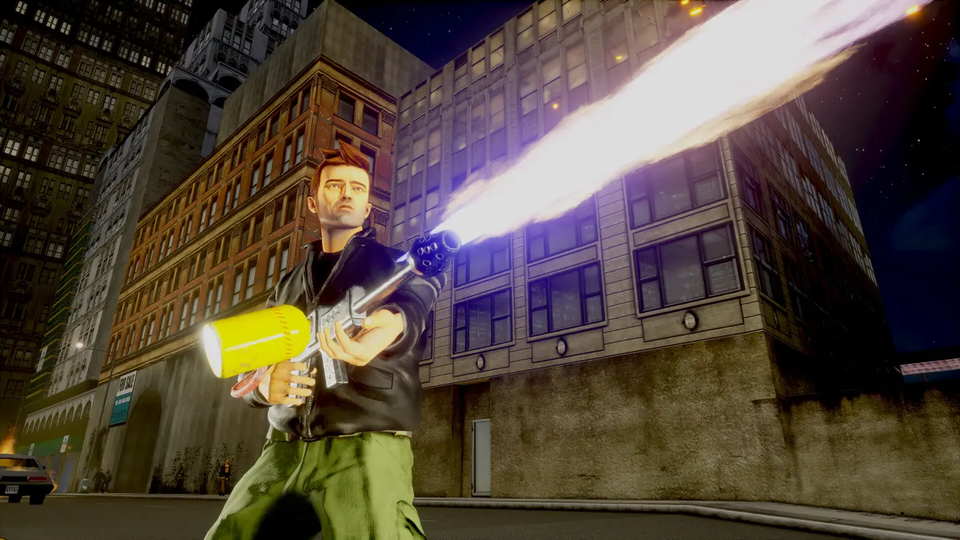 Claude in a leather jacket and green cargo pants firing a long jet of flame from a flamethrower on a Liberty City street at night, surrounded by brick buildings and skyscrapers