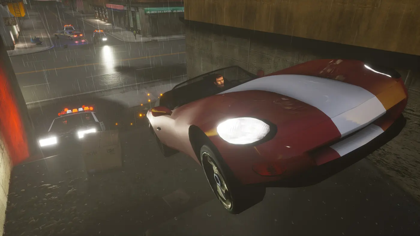 Red and white sports car with its headlights on in pouring rain on a wet Liberty City street at night, a police car's flashing lights reflected on the asphalt