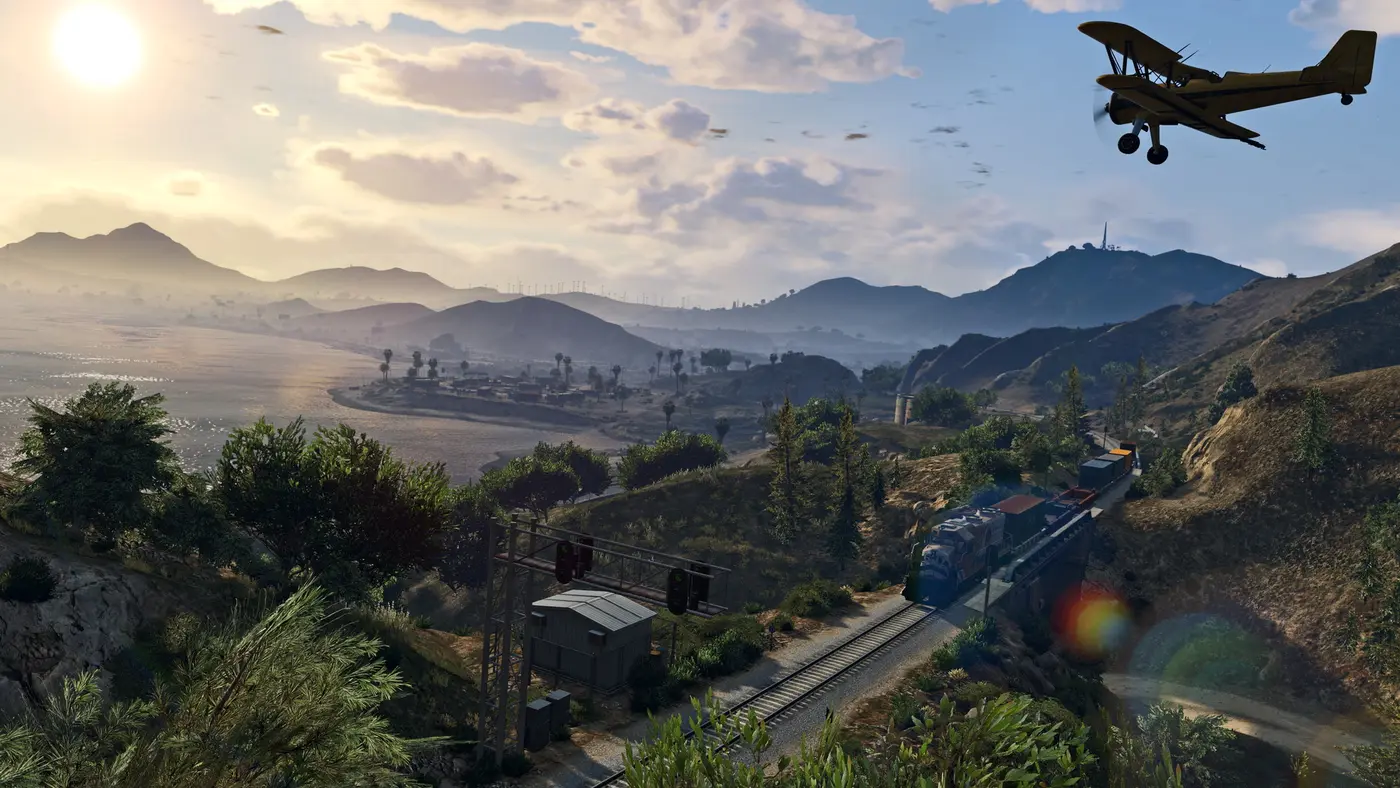 Panorama of Blaine County in GTA 5 with a biplane, a freight train and rolling hills