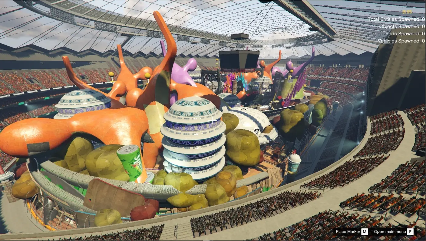 GTA 5 screenshot illustrating the Menyoo mod page: an indoor stadium filled with giant objects, orange sculptures and a soda can sitting on the track, stands in the background and the mod's entity counter in the top right