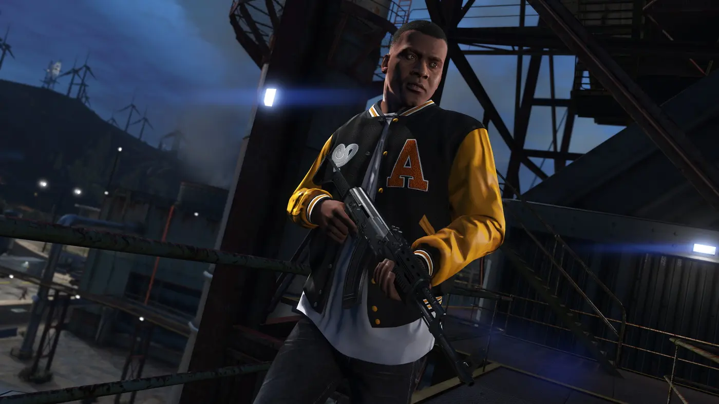Franklin Clinton in a black and yellow letterman jacket holding an assault rifle on a steel structure at night, wind turbines on the hills behind him