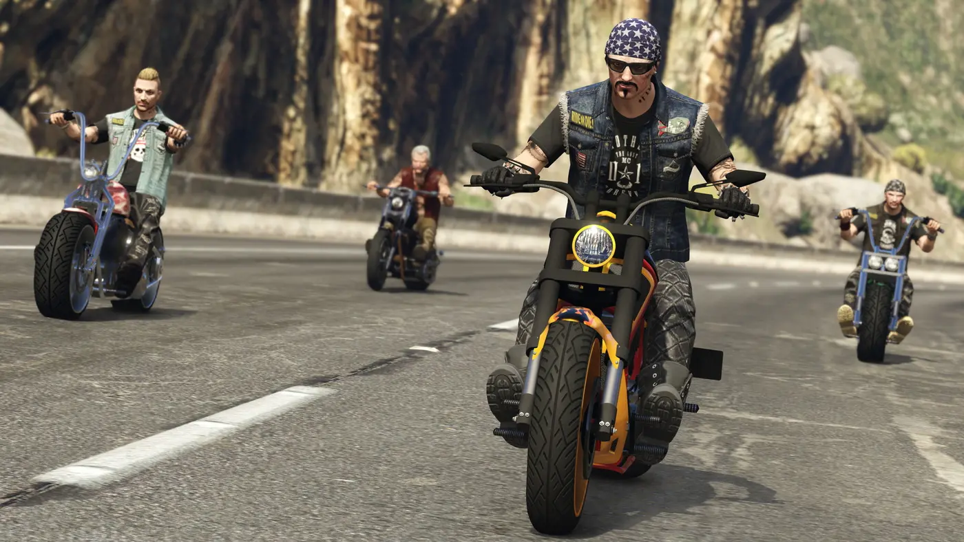 Group of GTA Online bikers riding in formation on a Blaine County mountain road
