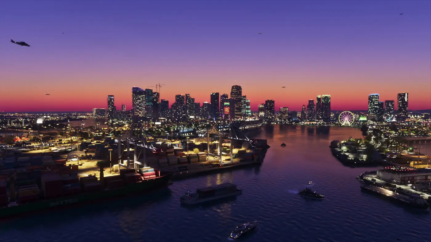 Aerial view of Vice City at dusk, glowing skyline and bay along the coast, in GTA 6