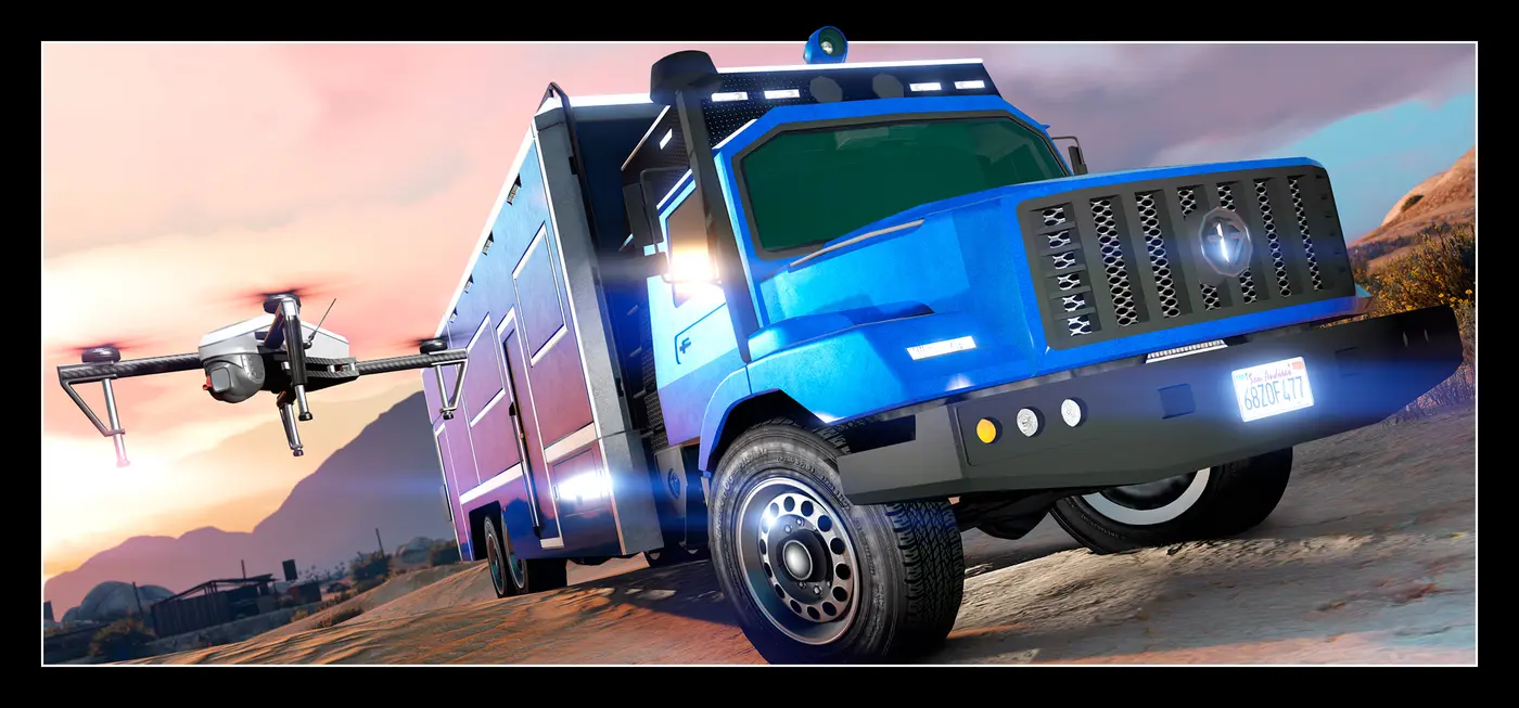 The Benefactor Terrorbyte, a large midnight-blue armored command truck, deploys a drone in the San Andreas desert at sunset