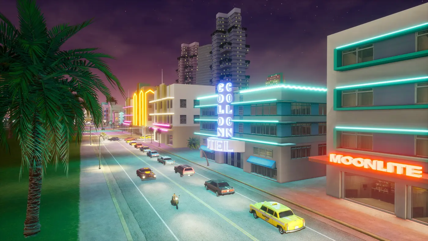 Vice City street at night lined with palm trees and Art Deco hotels glowing with pink, blue, and orange neon, with classic cars and a yellow cab on the road