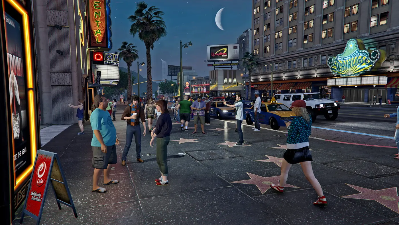 Vinewood Boulevard at night in GTA V: pedestrians on the Walk of Fame stars, yellow cabs, glowing theater marquees and a crescent moon