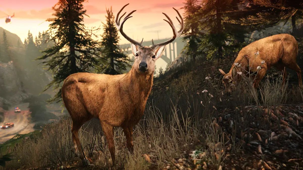 Two deer in a conifer forest at sunset in GTA V Enhanced, an arch bridge visible down in the valley