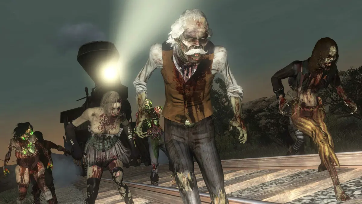 A group of zombies in torn clothes, including an old man with a white mustache, shambles along a railroad track in front of a locomotive with its headlight on