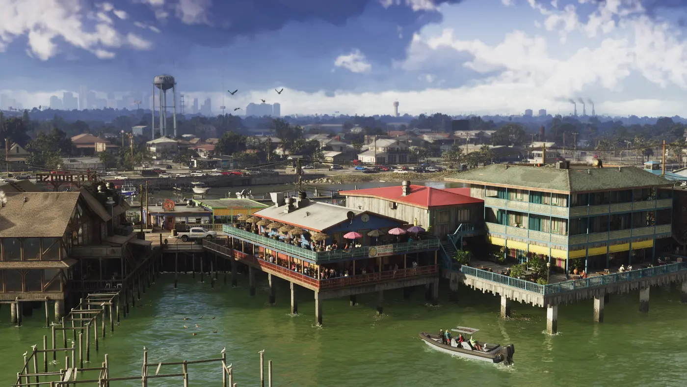 Wide view of a stilt-built waterfront with a restaurant, a boat on green water, and an urban skyline hazy in the distance, in GTA VI