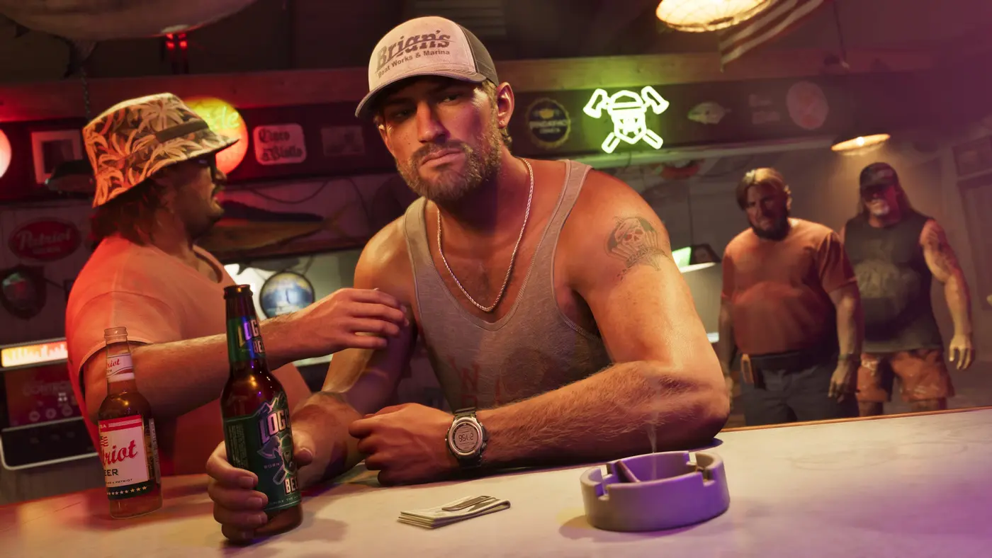 Jason Duval, in a light tank top and marina cap, leaning on the counter of a neon-lit bar, other patrons seated in the background in GTA VI