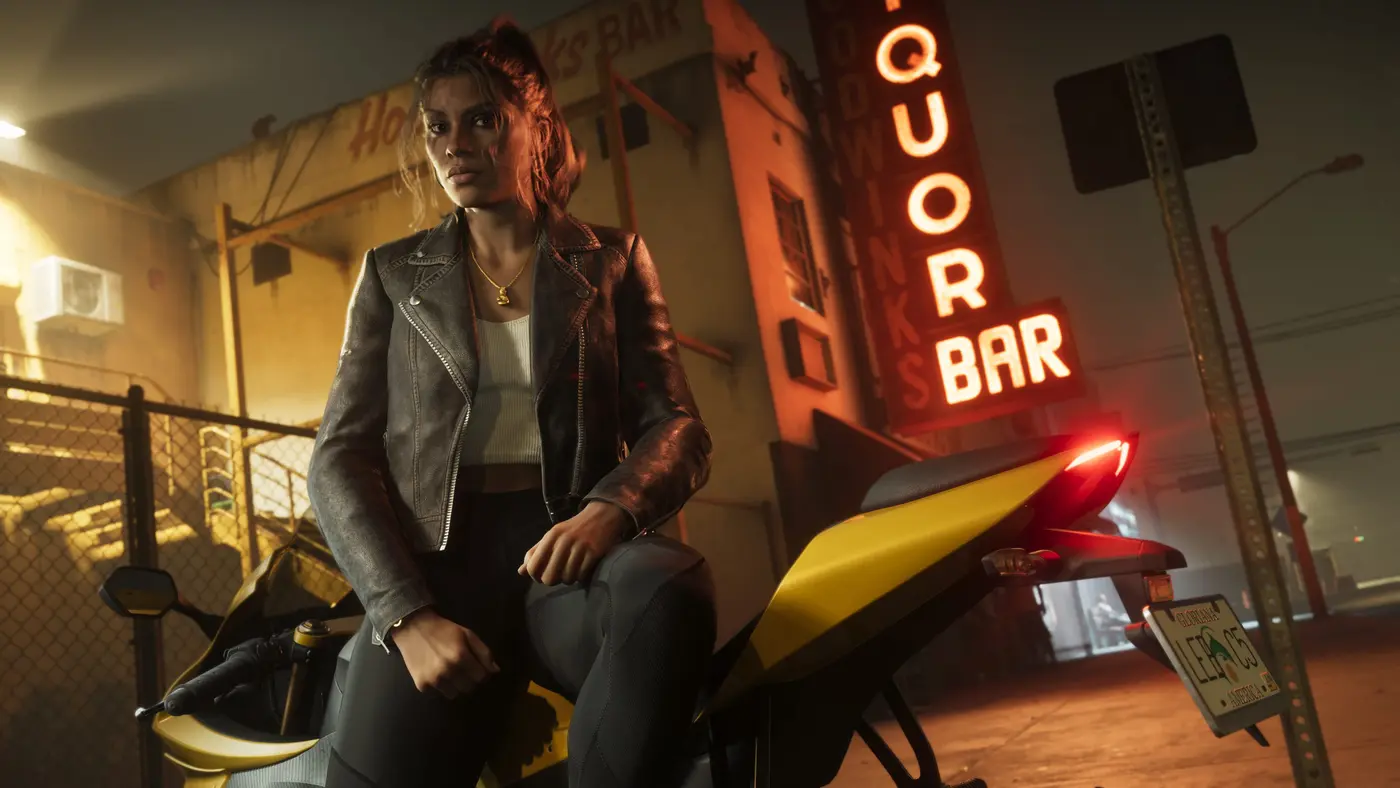 Lucia Caminos sitting on a yellow sport bike at night, in front of a neon 'Liquor Bar' sign on a Vice City street