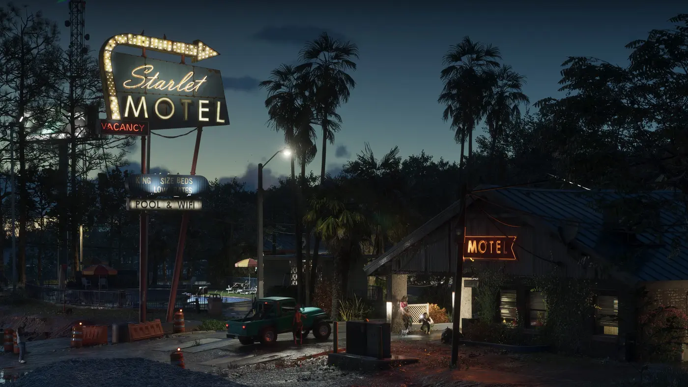 Neon sign of the 'Starlet Motel' lit up at dusk, palm trees and a pickup parked outside, in GTA 6