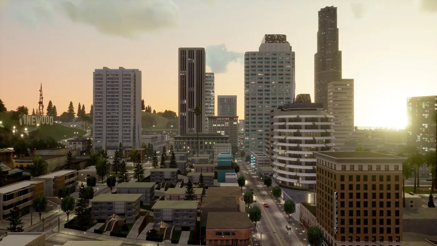 Screenshot from GTA San Andreas Definitive Edition: the Los Santos skyline at sunset, skyscrapers and the VINEWOOD sign on the hill, orange light