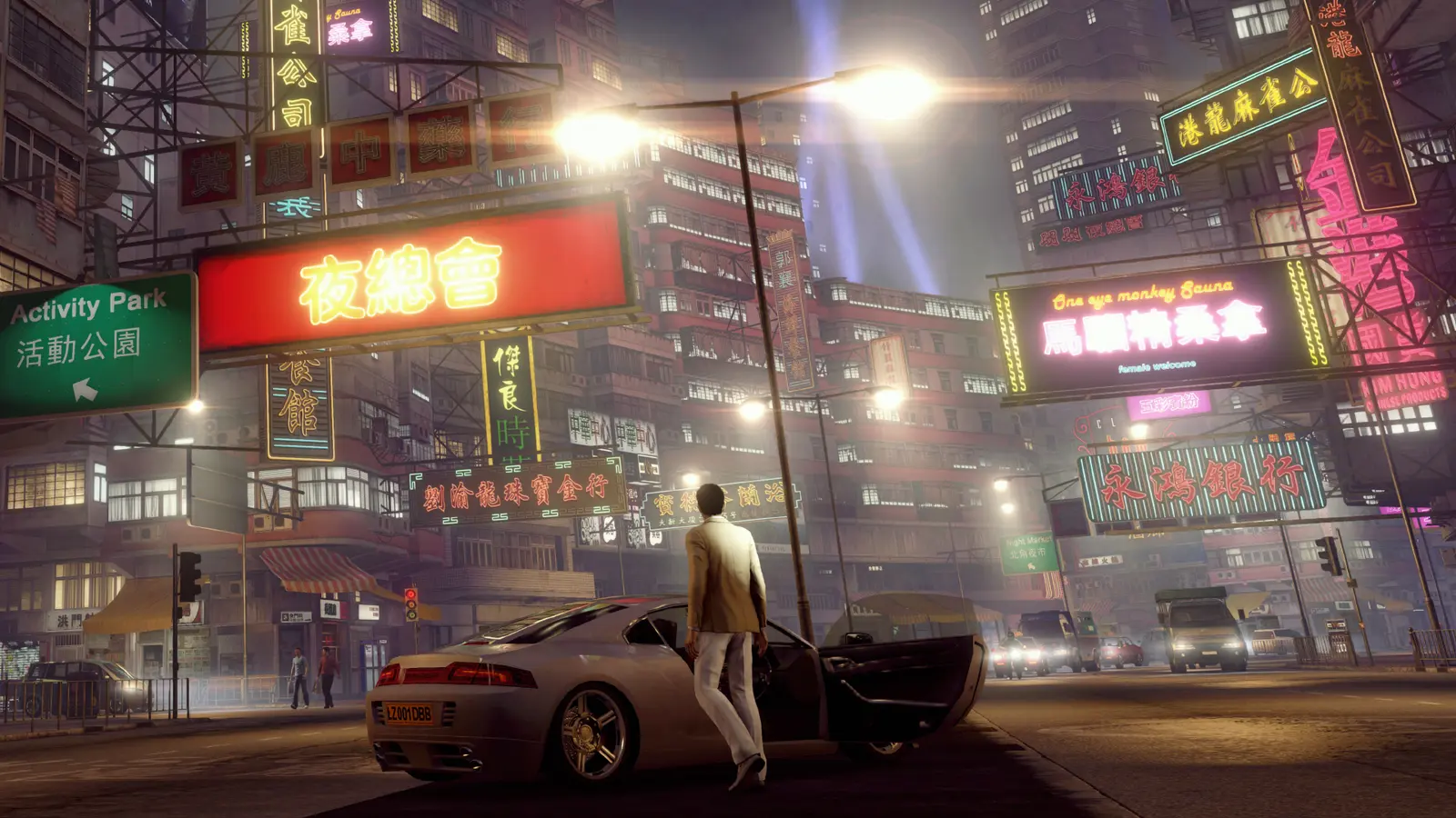 Wei Shen in a light suit steps out of a sports car on a Hong Kong street at night, awash in neon signs in Chinese characters, official Sleeping Dogs screenshot