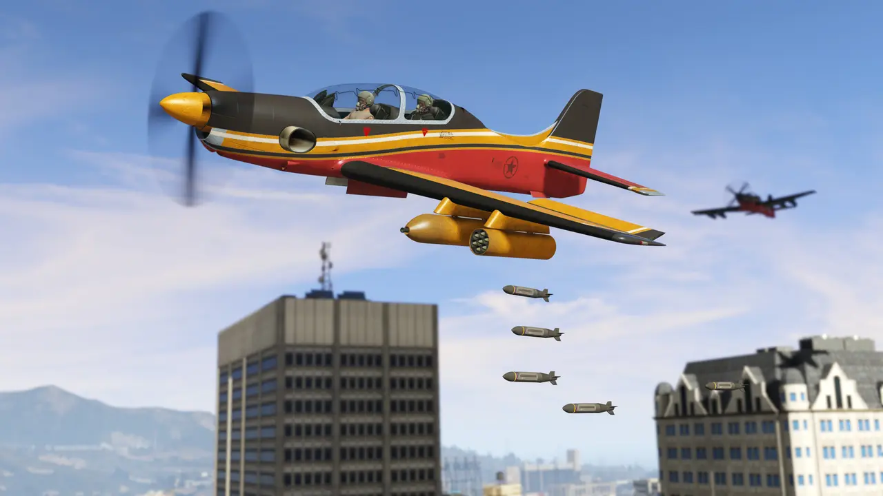 A red, black and yellow propeller plane with a rocket pod under its wing drops a row of bombs over the downtown Los Santos skyline, with a second plane closing in